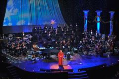 Wynonna Judd singing classic holiday music with the Band of the Air Force Reserve and Air Force Strings performing in background at 2008 Holiday Notes from Home concert