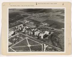 Vintage black and white aerial photograph of a Texas highway showing vehicles and surrounding landscape from San Angelo through San Antonio