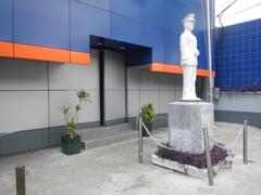 Statue of Admiral Tomás Arbolente Cloma Sr., founder of PMI Colleges, located at PMI Colleges campus in Quezon City