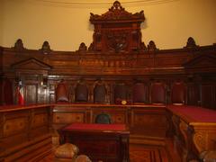 Supreme Court of Chile plenary hall with wooden paneling and seating