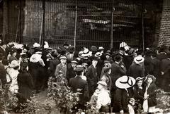 Visitors watching carnivores in Artis Zoo Amsterdam 1912