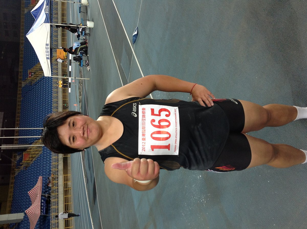 Taiwanese female shot put athlete Lin Chia-ying with thumbs up at Taipei Stadium