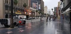 Hollywood Walk of Fame stars on the sidewalk in front of Hollywood Highland metro station
