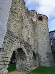 Historical city walls and fortifications in Brussels under a blue sky