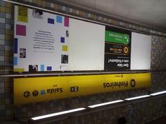 Platform panel at Pinheiros Station showing train schedule and information