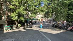 Place du Bourg-de-Four square with historic buildings and outdoor cafes in Geneva, Switzerland