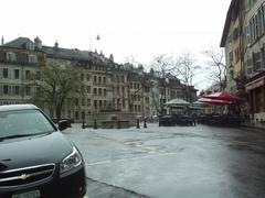 Place du Bourg-de-Four in Geneva Old Town on a rainy spring day