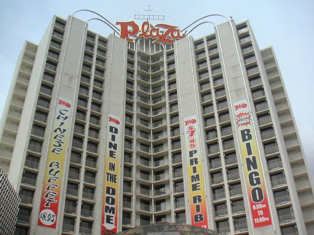 Plaza Hotel and Casino in Las Vegas at night with bright lights and signage