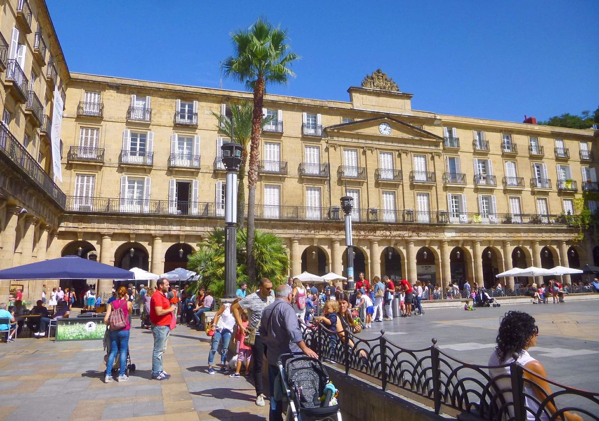 View of Bilbao Plaza Barria also known as Plaza Nueva with historic buildings and outdoor cafes