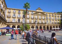 View of Bilbao Plaza Barria also known as Plaza Nueva with historic buildings and outdoor cafes