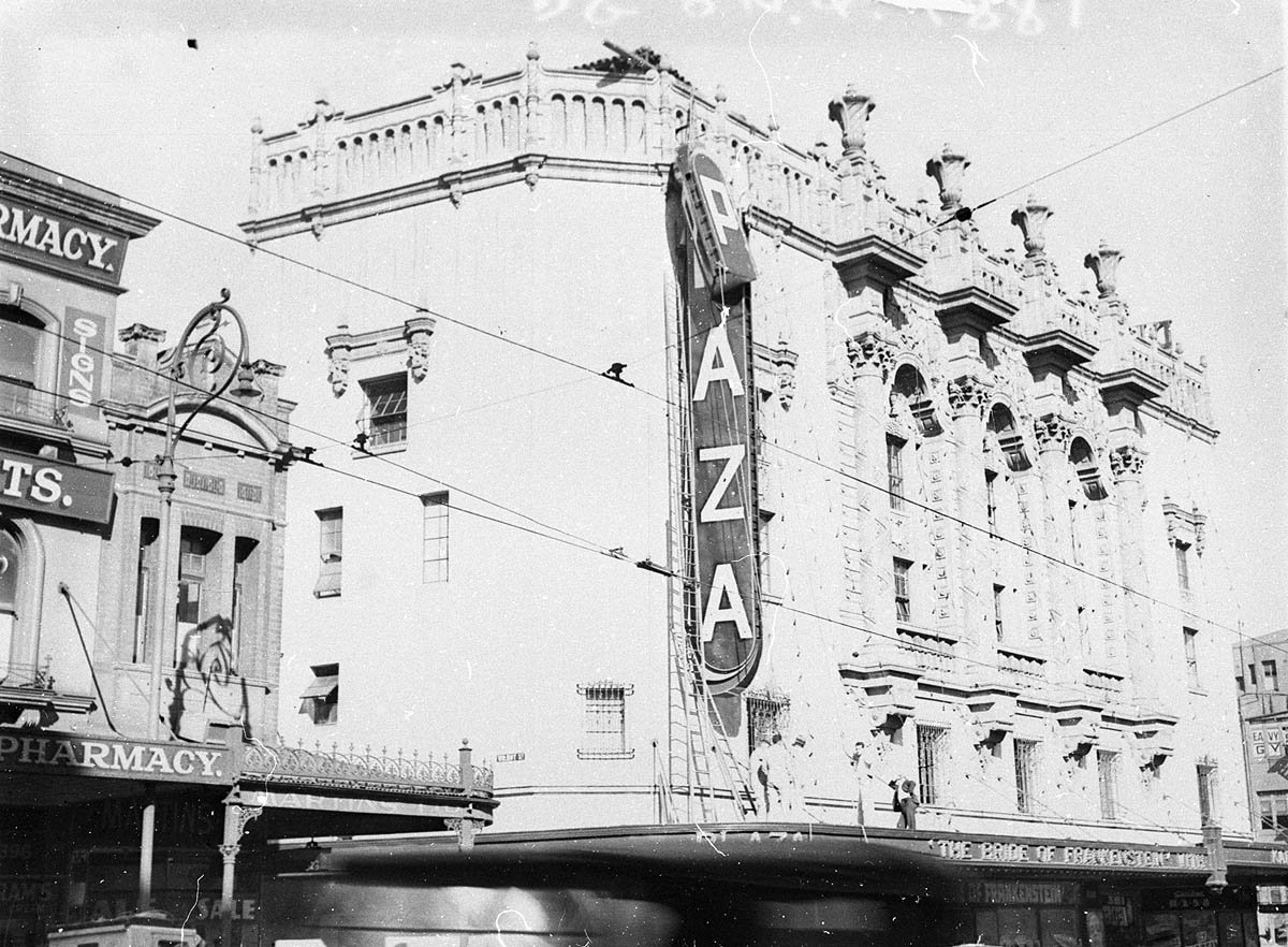 Erecting neon sign Plaza at Plaza Theatre, 600 George Street, Sydney, circa 1935
