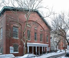 Plymouth Church of the Pilgrims covered in snow on a sunny late afternoon in Brooklyn ZIP 11201