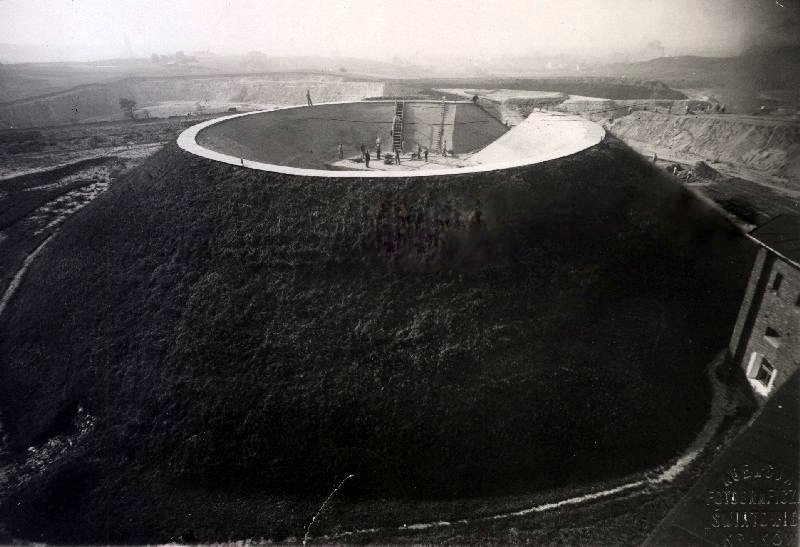 Krakus Mound archaeological excavation site with trenches and ancient artifacts