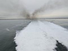 Dublin Port pilot boat following Dublin to Holyhead ferry at Dublin Port