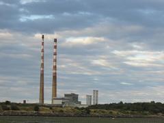 Poolbeg power plant with its iconic red and white chimneys in Dublin, Ireland