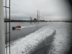 Dublin Port pilot boat following a ferry leaving Dublin harbor
