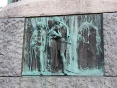 Bronze relief depicting Črtomir and Bogomila's farewell from The Baptism on the Savica poem at Prešeren Monument in Ljubljana