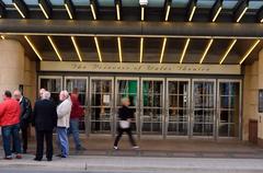 Princess of Wales Theatre building illuminated during twilight in Toronto