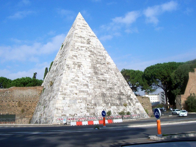Pyramid of Cestius in Rome under clear blue sky