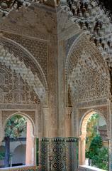 Detailed view of two ornate windows on the Daraxa balcony in the Lions Palace at the Alhambra, Granada, Spain