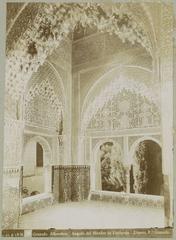 Corner of the Mirador de Lindaraja in the Alhambra fortress showcasing intricate stucco relief sculpture