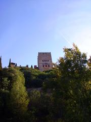 View of the Alhambra palace in Granada Spain from downhill Carrera del Darro