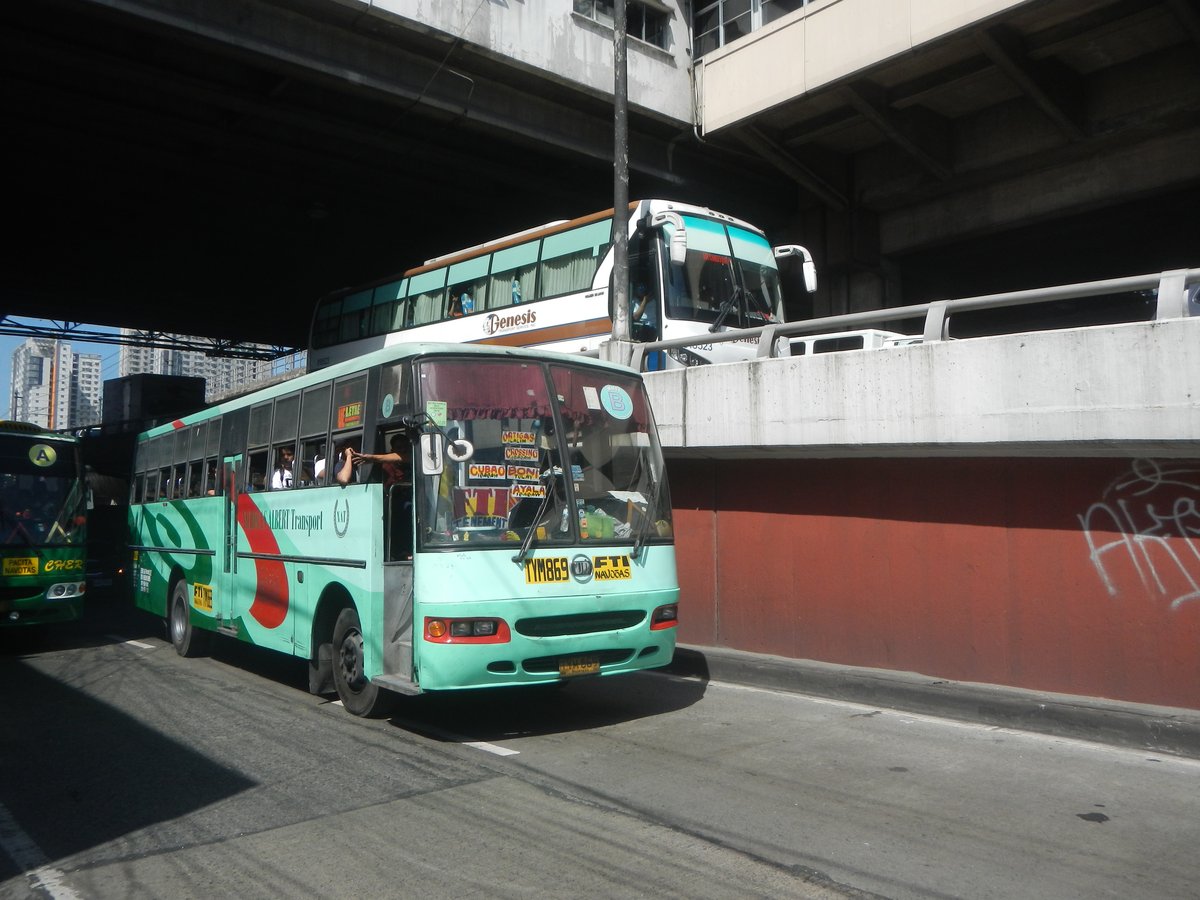 Quezon Avenue MRT Station and Eton Centris area in Quezon City with nearby Cyberpod Centris buildings and busy urban road