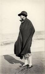 Victoria Ocampo sitting on the beach at Mar del Plata