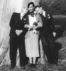 Igor Stravinsky with dark glasses and his son Sulima pretending to sleep on Victoria Ocampo's shoulders during 1936 visit