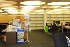 Interior of Alexander Library of Ornithology before renovation with empty shelves