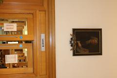 Portrait painting of J. Jacobus Dillenius, M.D. above the entrance to Worthington Wing at Radcliffe Science Library Oxford