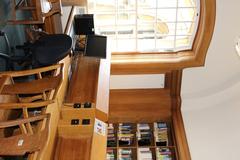 Interior of Worthington Wing at Radcliffe Science Library with desk, desktop computer, and window