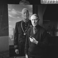 Painter Carel Willink standing beside the painting he made of Mayor Joost Johannes Gerardus Boot of Hilversum in 1966