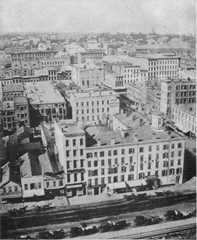 Historic black and white photograph of Chicago from 1858 showing the view northeast from the Court-house with Randolph Street in the foreground