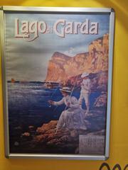 Vintage 1919 Lake Garda travel advertisement depicting scenic views