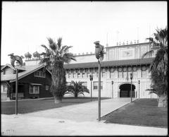 Exterior view of the First Shriners Auditorium, Moorish-style architecture with ornamental moldings, horseshoe arches, onion-shaped towers, and crescent moon lamp posts, Los Angeles, early 1900s