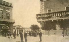 Historical view of Piazza Regina in Valletta, Malta in 1902 featuring vintage buildings and early 20th century street scene