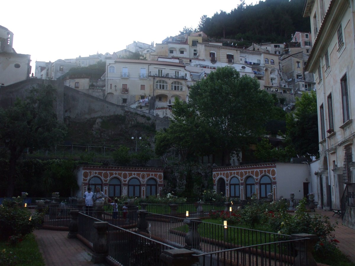 Giardini Palazzo Mezzacapo garden in Maiori Italy with vibrant greenery and classical architecture