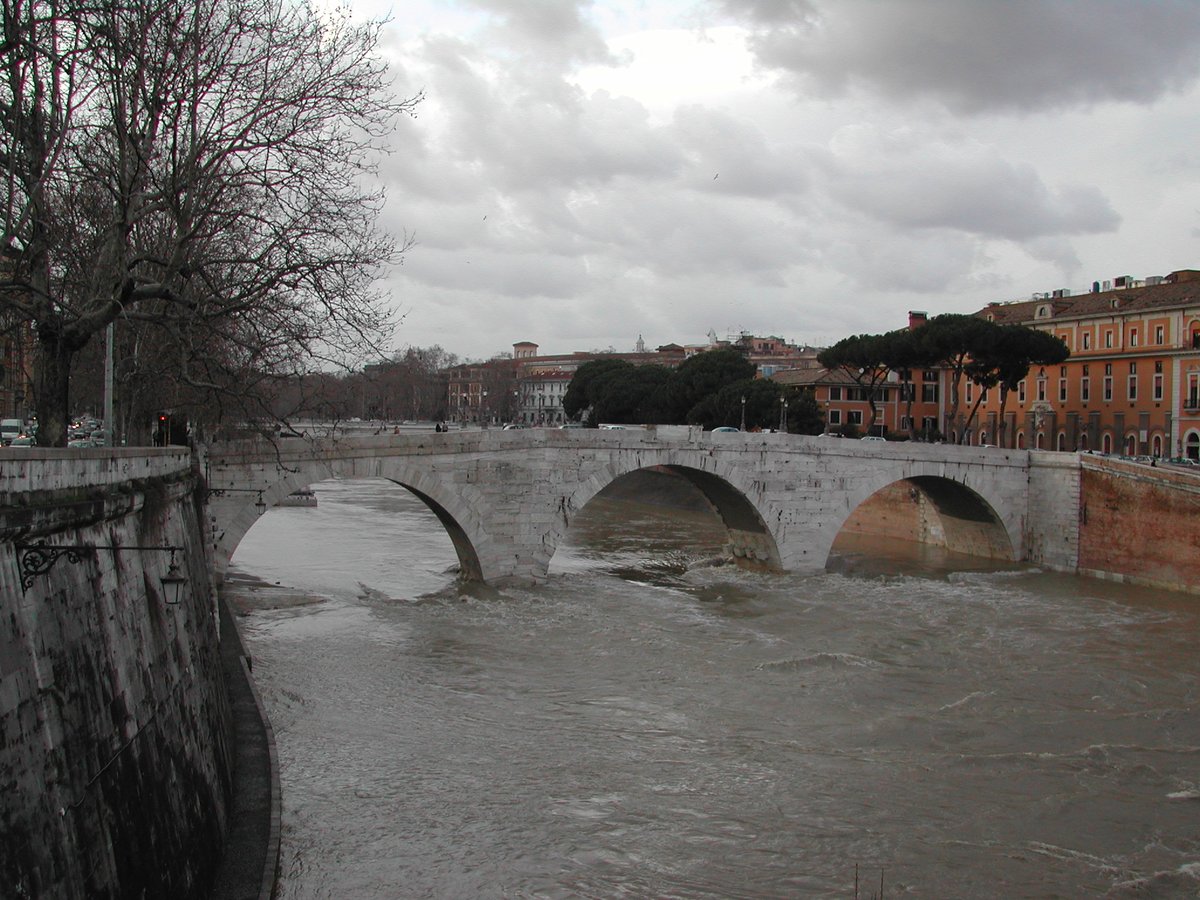Rome Tiber River with Ponte Cestio bridge upstream