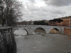 Rome Tiber River with Ponte Cestio bridge upstream