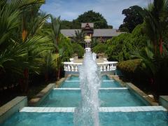 The Sultanate Gardens in Melaka city featuring lush greenery and traditional architecture