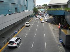 North Avenue and EDSA interchange near SM City North EDSA in Quezon City with high-rise buildings and traffic