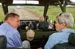 U.S. Secretary of State John Kerry speaking with Ian Craig, Director of Conservation, at Nairobi National Park, Kenya