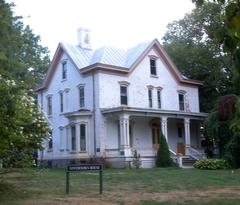 Governor's House viewed from the southwest on a mostly cloudy afternoon