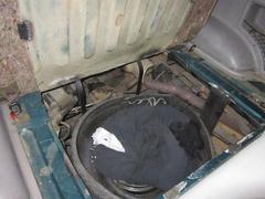 US Customs and Border Protection officers discovering a person concealed in spare tire compartment of an SUV