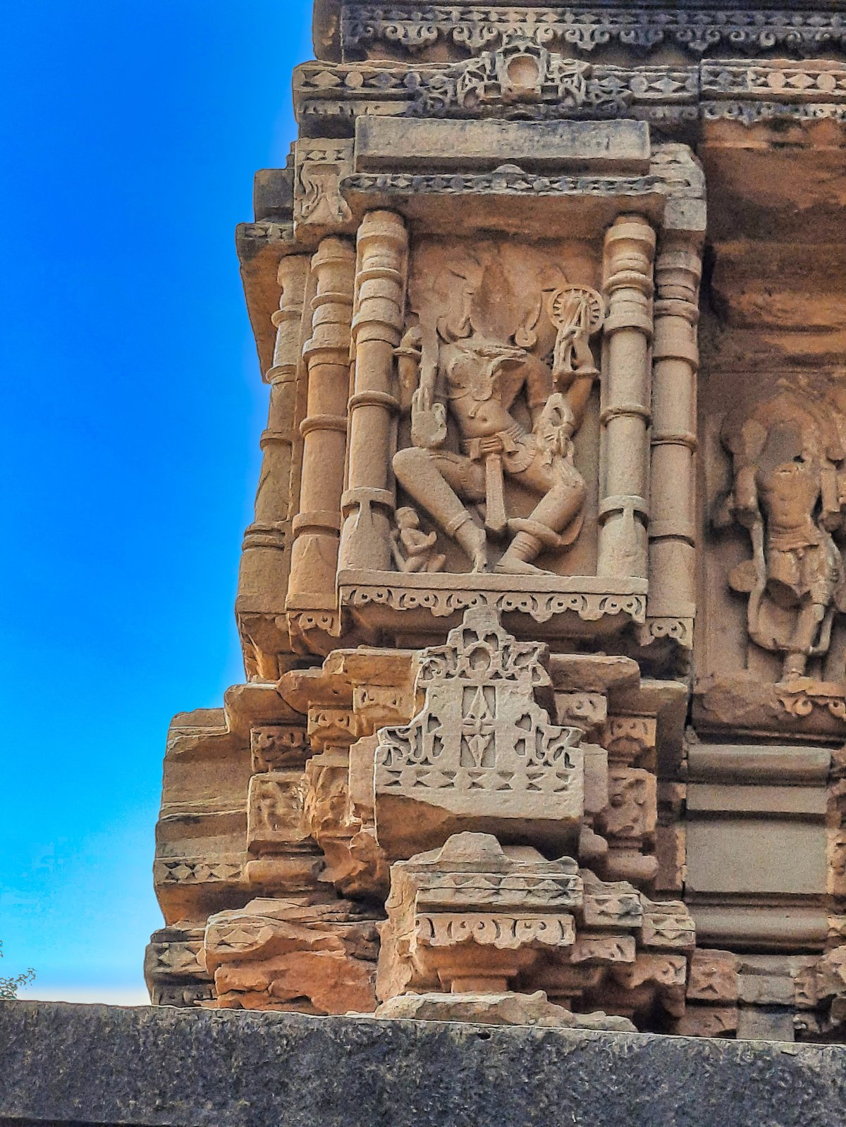 Sasbahu Temple of Gwalior Fort, 11th century twin Hindu temple with carved walls and three floors, ruins showing damaged sculptures and broken stone structures