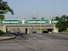 Westbound GO train on Lakeshore East line crossing St. Clair Avenue West entering Scarborough GO Station
