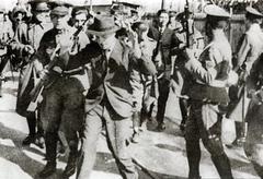 Historical photo of Chilean Seguro Obrero Massacre on September 5, 1938 showing Nazi members escorted by police