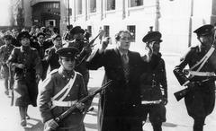 Federal police escorting surrendered Nazi party members after failed insurrection in Santiago, Chile on September 5, 1938