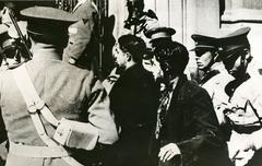Two captured Nazis held by police during Chilean revolt in Santiago